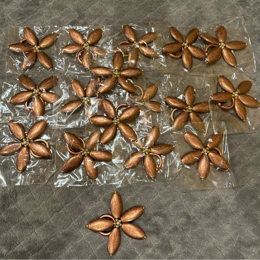 Bulk of Bronze Flower Napkin Rings Set